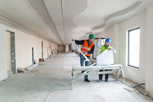 Drywall, shown here, is one of the building materials that can be negatively impacted by temperature and humidity fluctuations in apartment complex construction